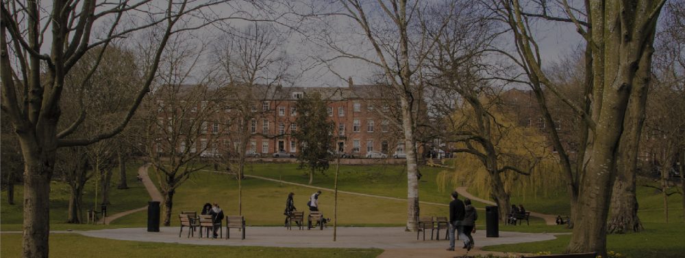 The Square in spring with people walking and talking