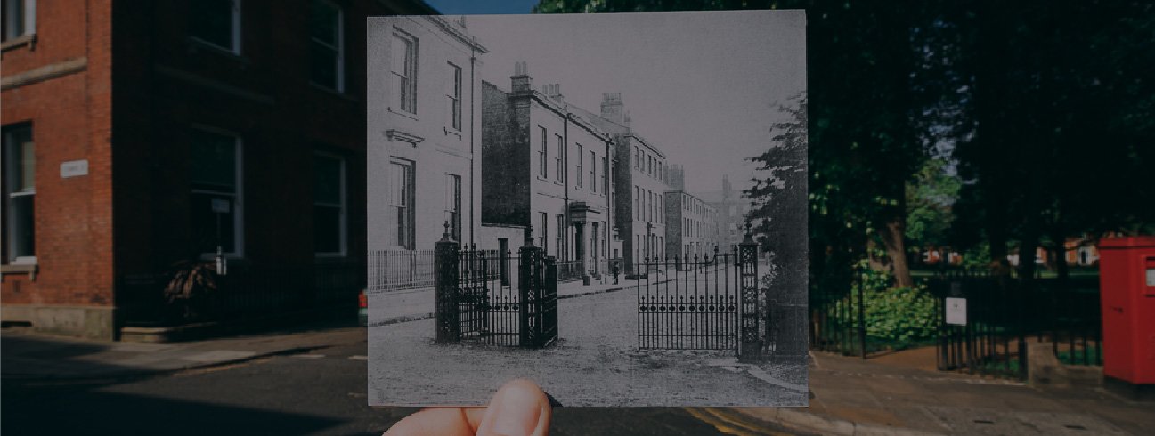 Photograph of the old Winckley Square held up against the current Winckley Square