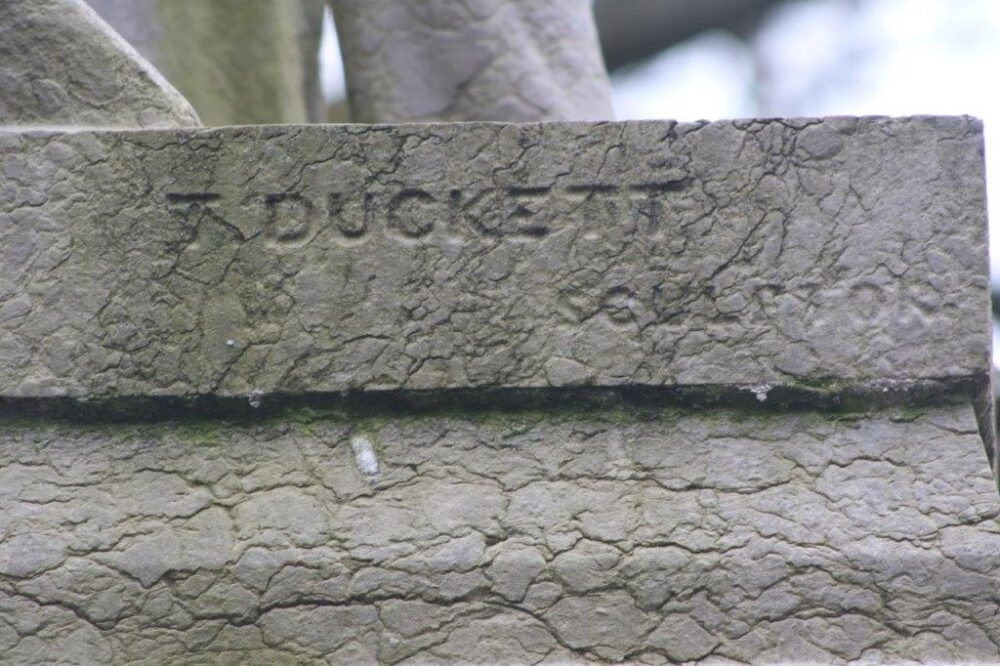 T. DUCKETT, SCULPTOR is carved into the plinth