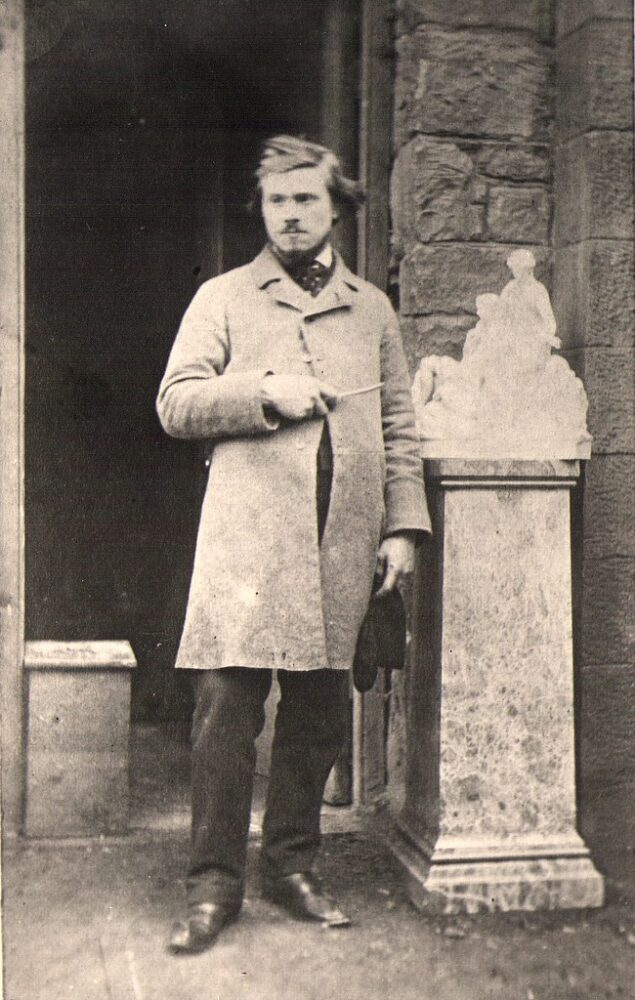 Thomas Duckett Jnr. standing next to the maquette of ‘Night and Twilight’’ Robert Pateson 1865. Harris Museum, Art Gallery and Library: